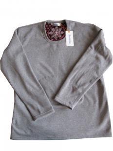 生物磁套服 服裝批發(fā)市場(chǎng)的新寵——探秘珊瑚絨套服熱銷(xiāo)背后的健康潮流